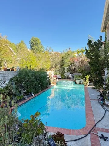 a view of a lake with a yard