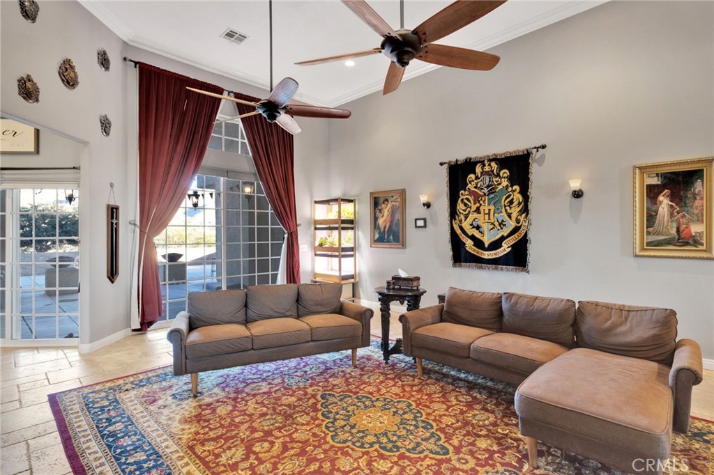 15485 Barker Road Apple Valley, CA 92307 - Photo 17 of 64 a living room with furniture and a rug