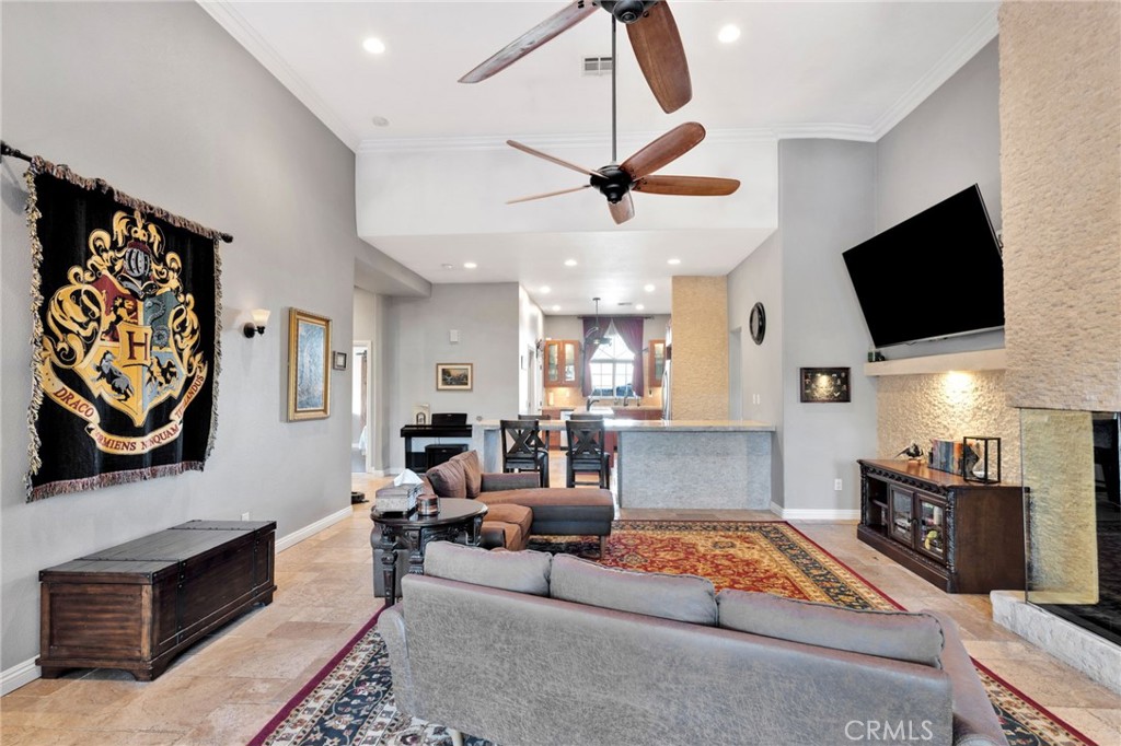 15485 Barker Road Apple Valley, CA 92307 - Photo 18 of 64 a living room with furniture and a flat screen tv