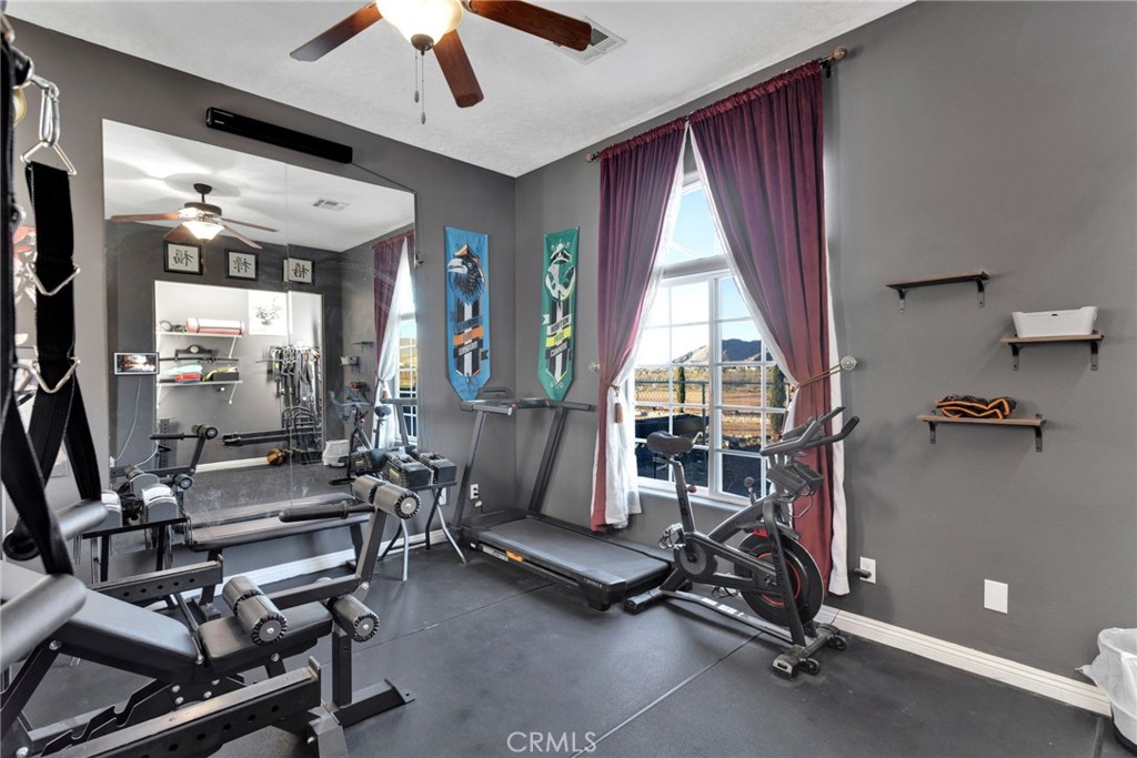 15485 Barker Road Apple Valley, CA 92307 - Photo 40 of 64 a room with gym equipment