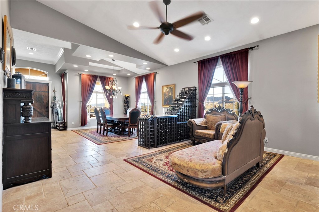 15485 Barker Road Apple Valley, CA 92307 - Photo 4 of 64 a living room with furniture and a large window