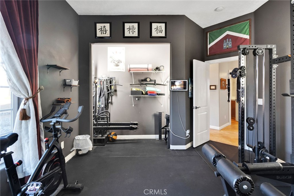 15485 Barker Road Apple Valley, CA 92307 - Photo 41 of 64 a view of a room with gym equipment