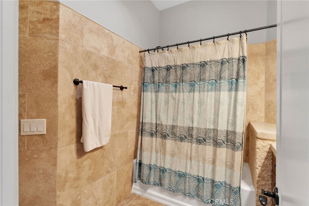 15485 Barker Road Apple Valley, CA 92307 - Photo 45 of 64 a bathroom with a shower