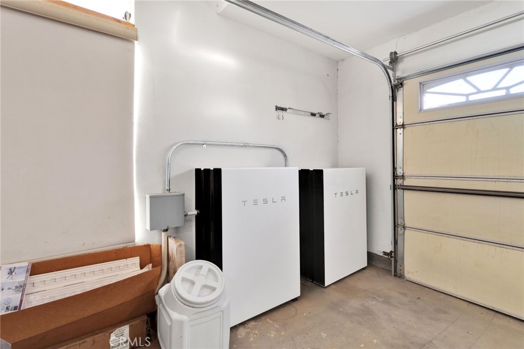 15485 Barker Road Apple Valley, CA 92307 - Photo 50 of 64 a bathroom with a toilet a sink and a mirror