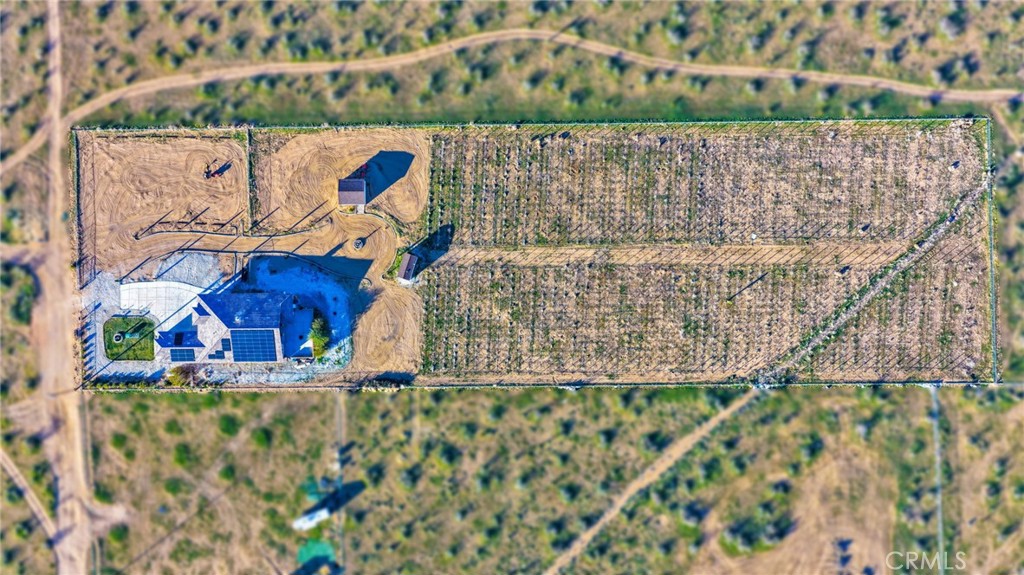 15485 Barker Road Apple Valley, CA 92307 - Photo 61 of 64 a wooden bench sitting in front of a building