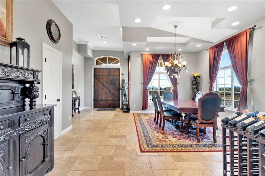 15485 Barker Road Apple Valley, CA 92307 - Photo 9 of 64 a view of a dining room with furniture window and wooden floor