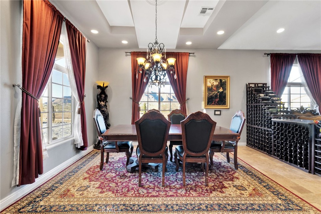 15485 Barker Road Apple Valley, CA 92307 - Photo 10 of 64 a view of a dining room with furniture window and wooden floor