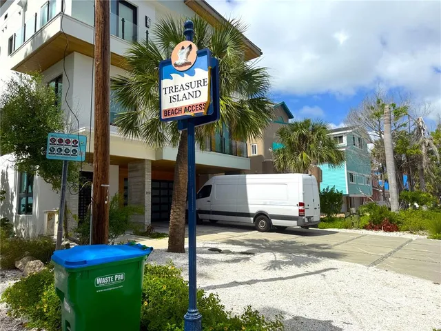 a view of an empty room and wooden floor