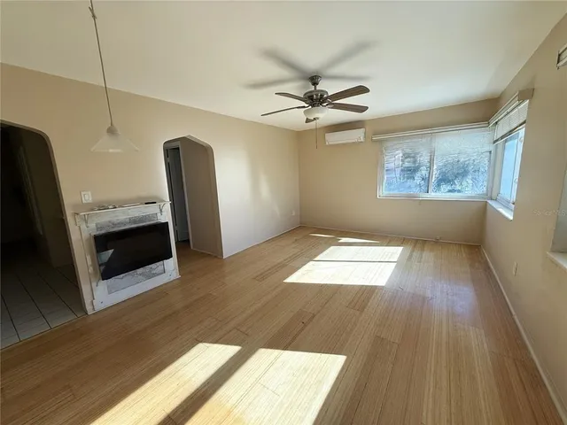 a view of a kitchen from a hallway