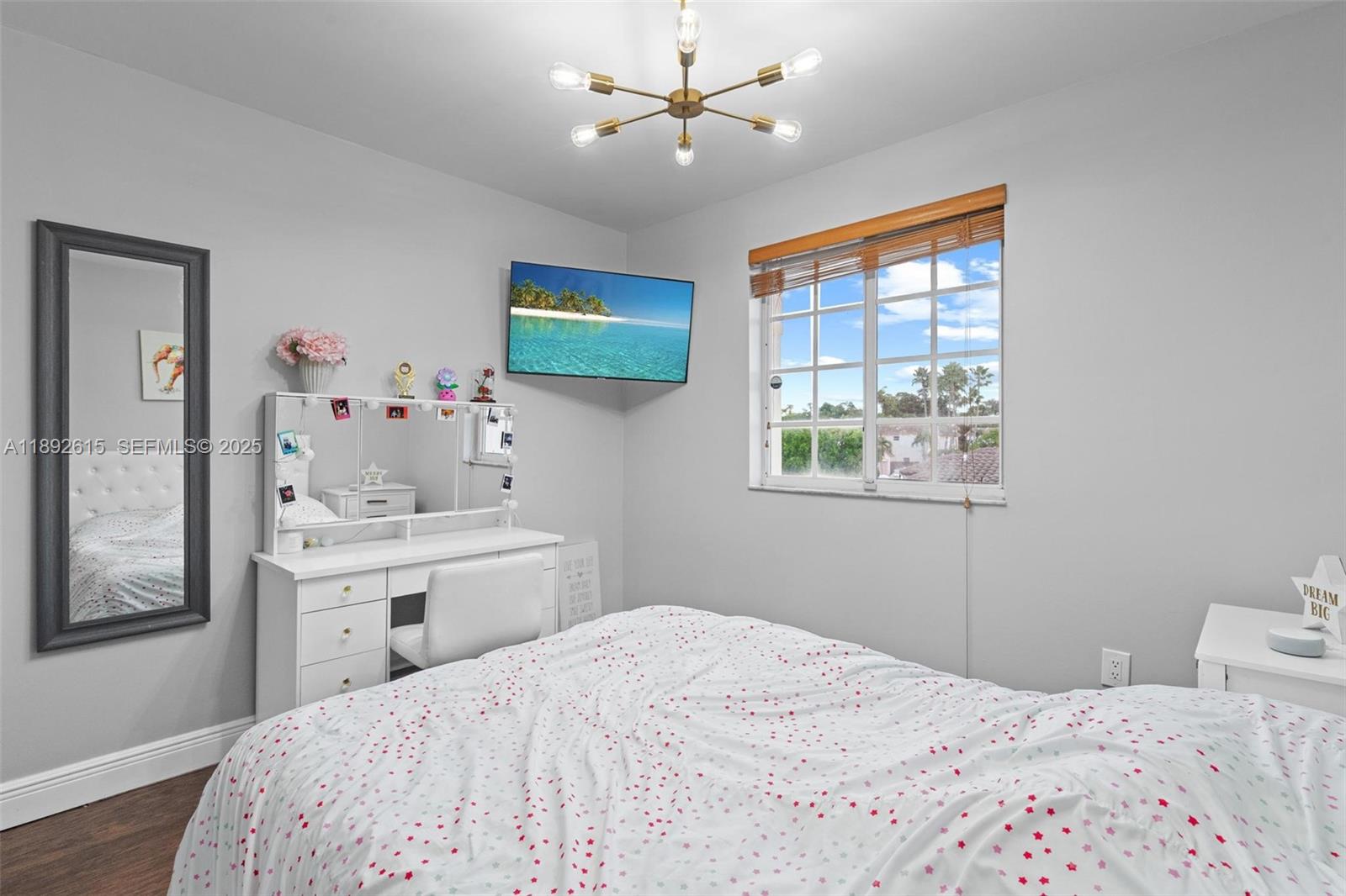 15025 Southwest 141st Terrace Miami, FL 33196 - Photo 23 of 34 a bedroom with a bed and a window