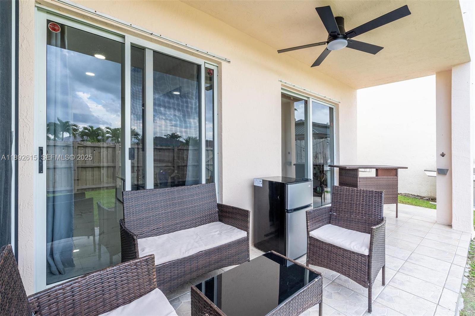 15025 Southwest 141st Terrace Miami, FL 33196 - Photo 33 of 34 a balcony with furniture