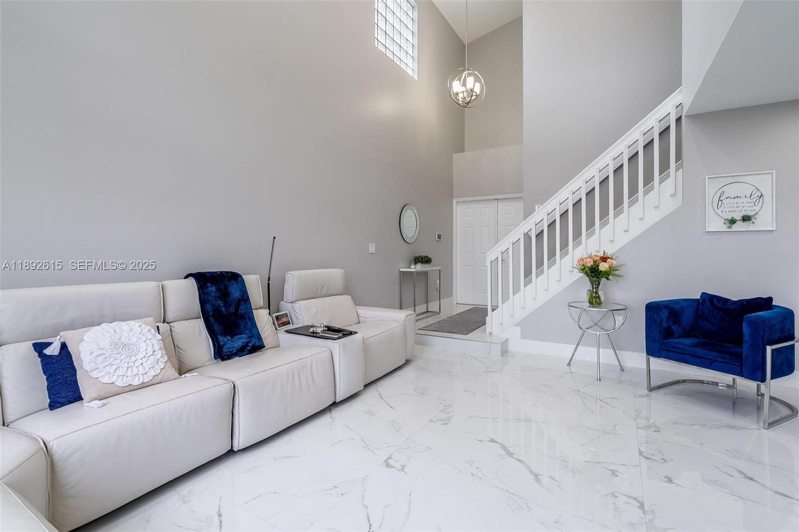 15025 Southwest 141st Terrace Miami, FL 33196 - Photo 10 of 34 a living room with furniture and wooden floor