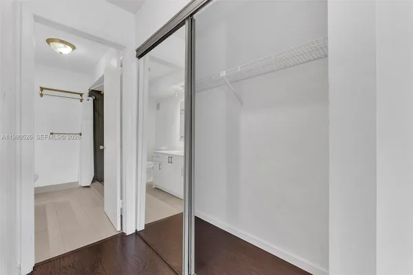 a bathroom with a sink double vanity and a mirror