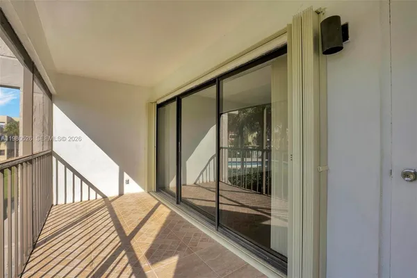 a view of a balcony with lake view