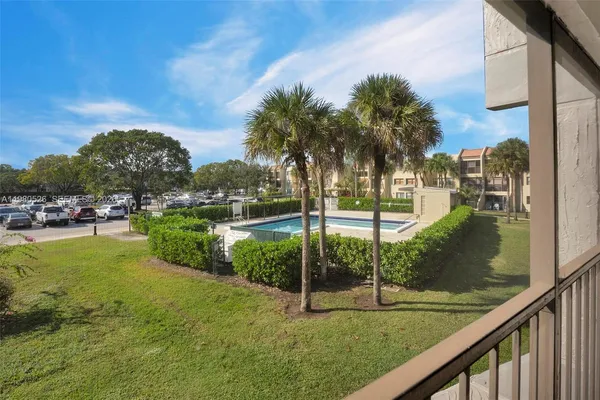 a view of a lake with a big yard