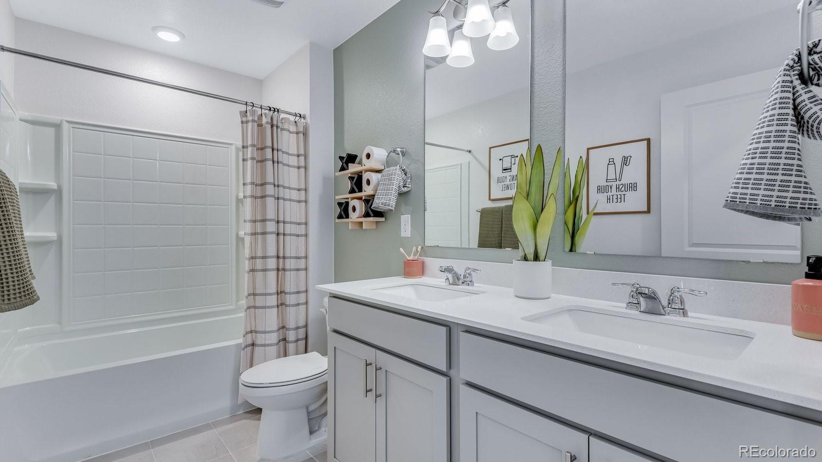 799 Ayrshire Road Johnstown, CO 80534 - Photo 22 of 36 a bathroom with a sink a toilet and shower