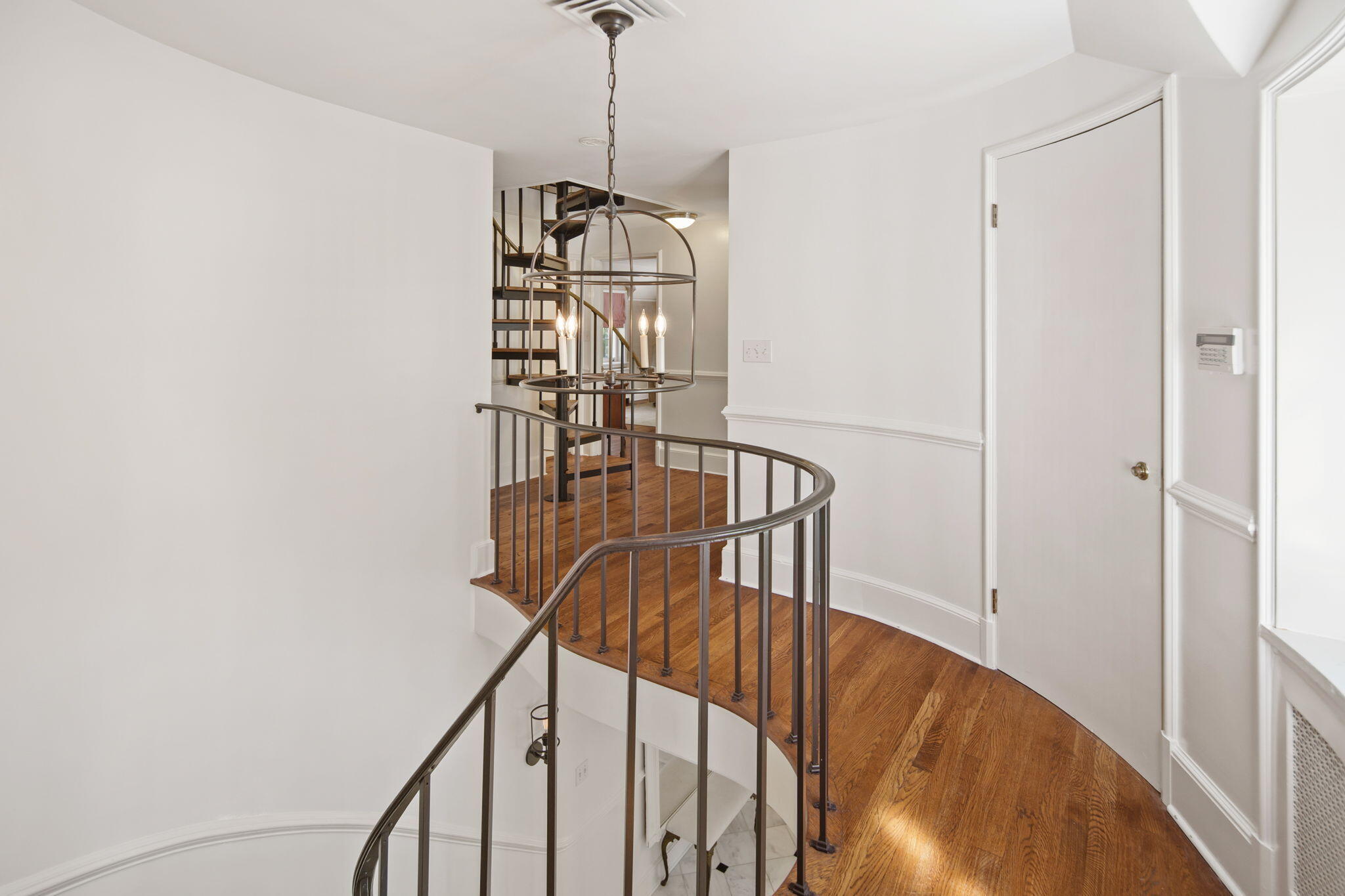 231 Cannon Road Wilton, CT 06897 - Photo 18 of 48 a view of entryway and hall with wooden floor