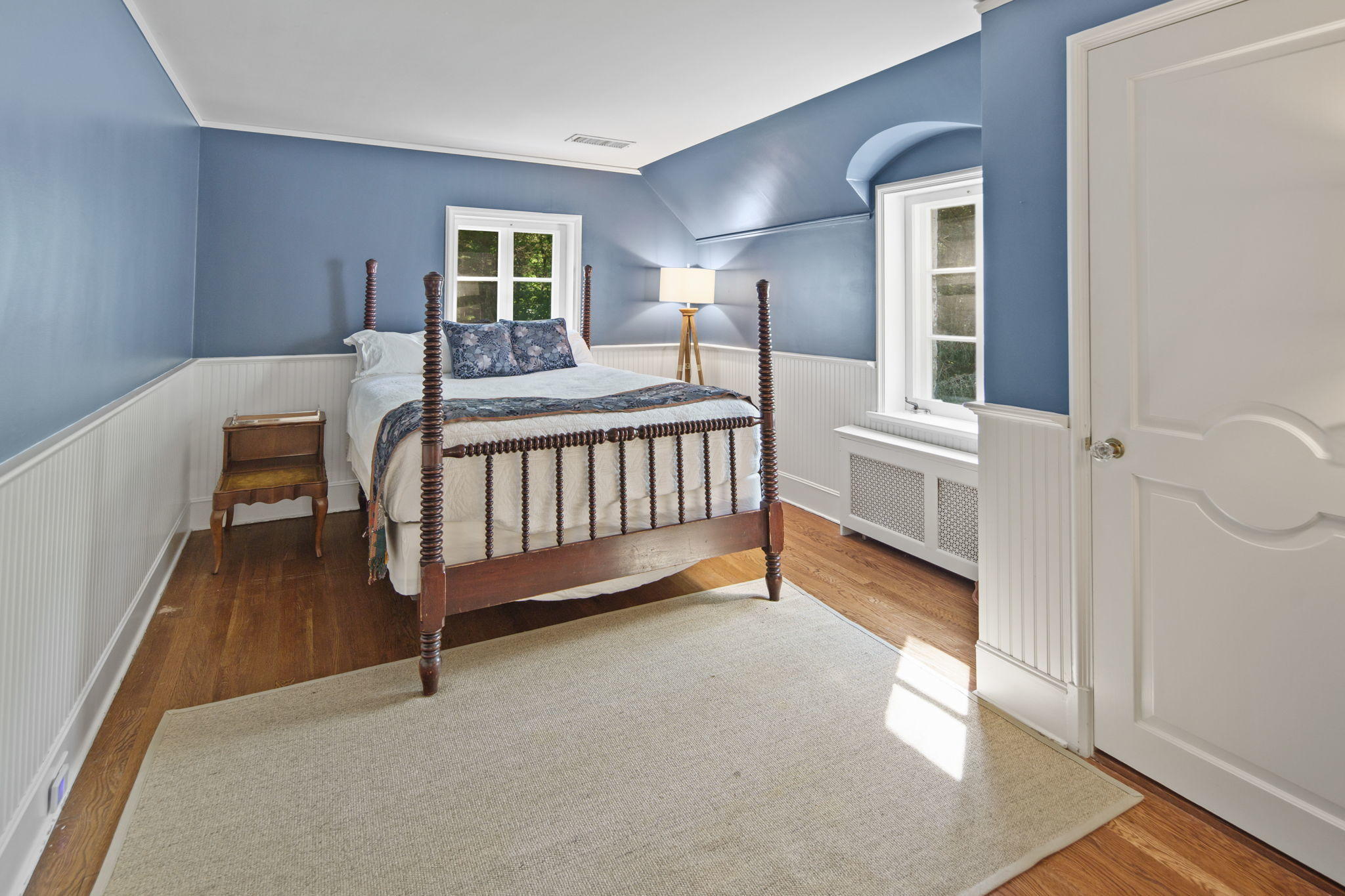 231 Cannon Road Wilton, CT 06897 - Photo 26 of 48 a bedroom with a bed and a window