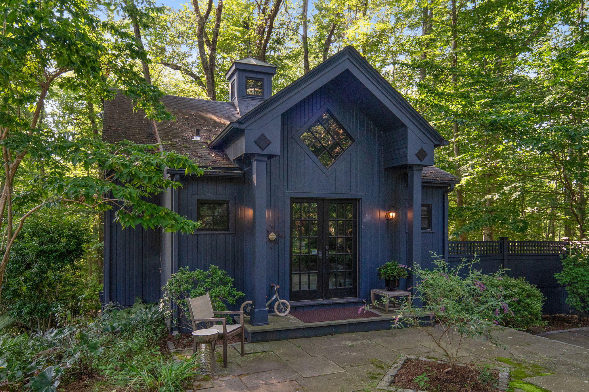 231 Cannon Road Wilton, CT 06897 - Photo 30 of 48 a front view of a house with a yard