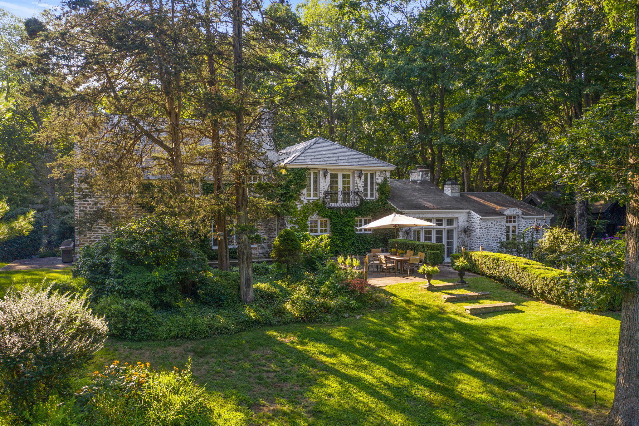 231 Cannon Road Wilton, CT 06897 - Photo 45 of 48 a view of a patio with swimming pool