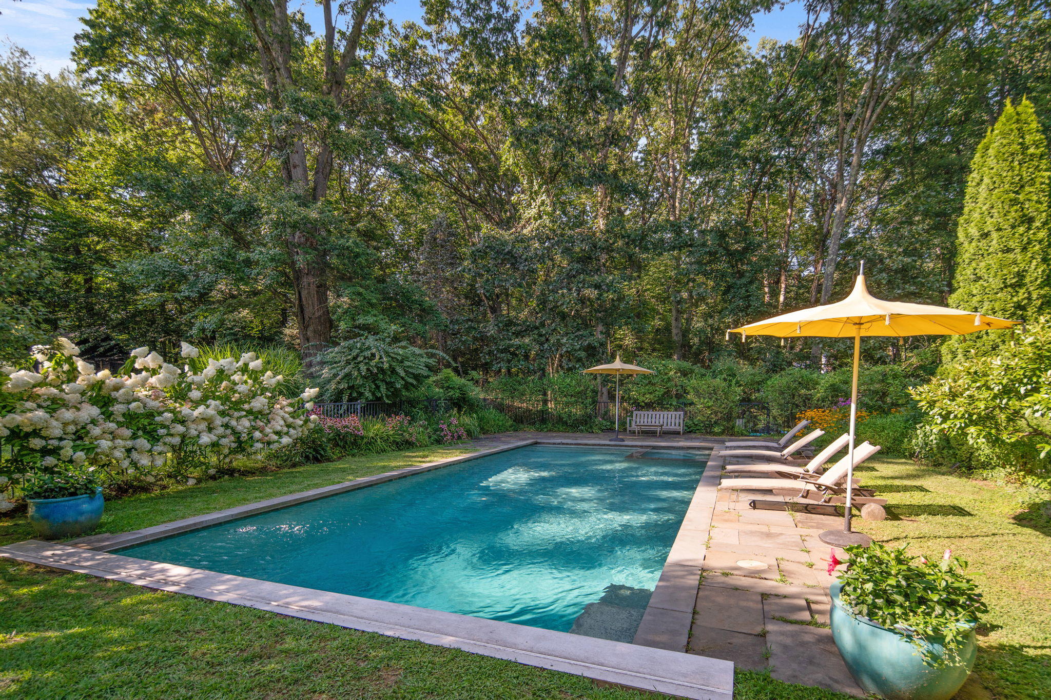 231 Cannon Road Wilton, CT 06897 - Photo 47 of 48 a garden view with a seating space