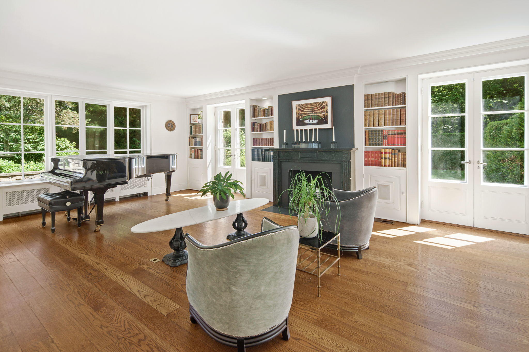 231 Cannon Road Wilton, CT 06897 - Photo 5 of 48 a living room with fireplace furniture and a large window