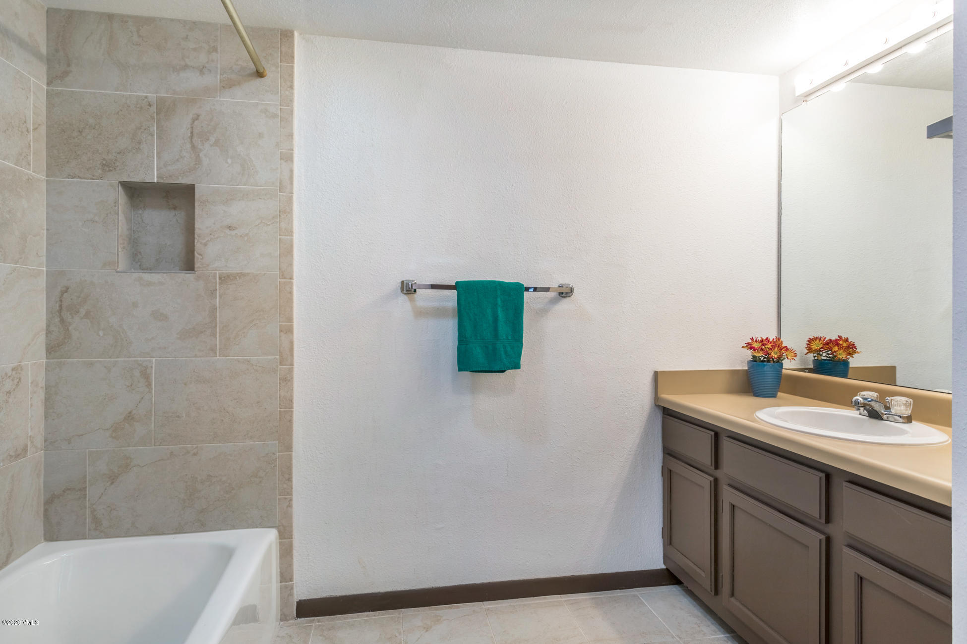 225 Gopher Road, Unit H54 Avon, CO 81620 - Photo 15 of 33 a bathroom with a sink and a bathtub
