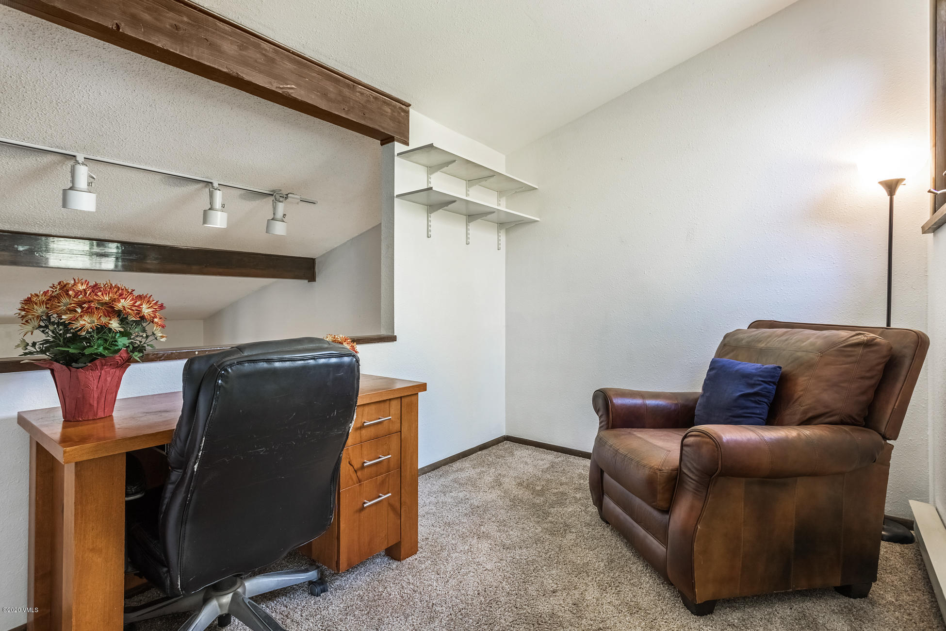 225 Gopher Road, Unit H54 Avon, CO 81620 - Photo 18 of 33 a view of workspace with furniture and a potted plant
