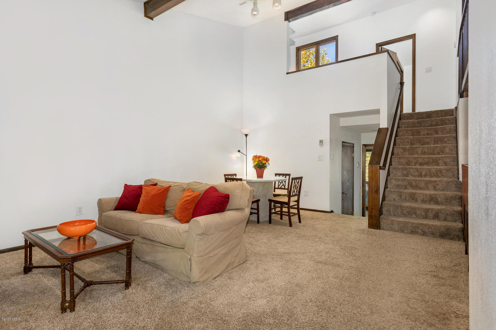 225 Gopher Road, Unit H54 Avon, CO 81620 - Photo 2 of 33 a living room with furniture and a rug