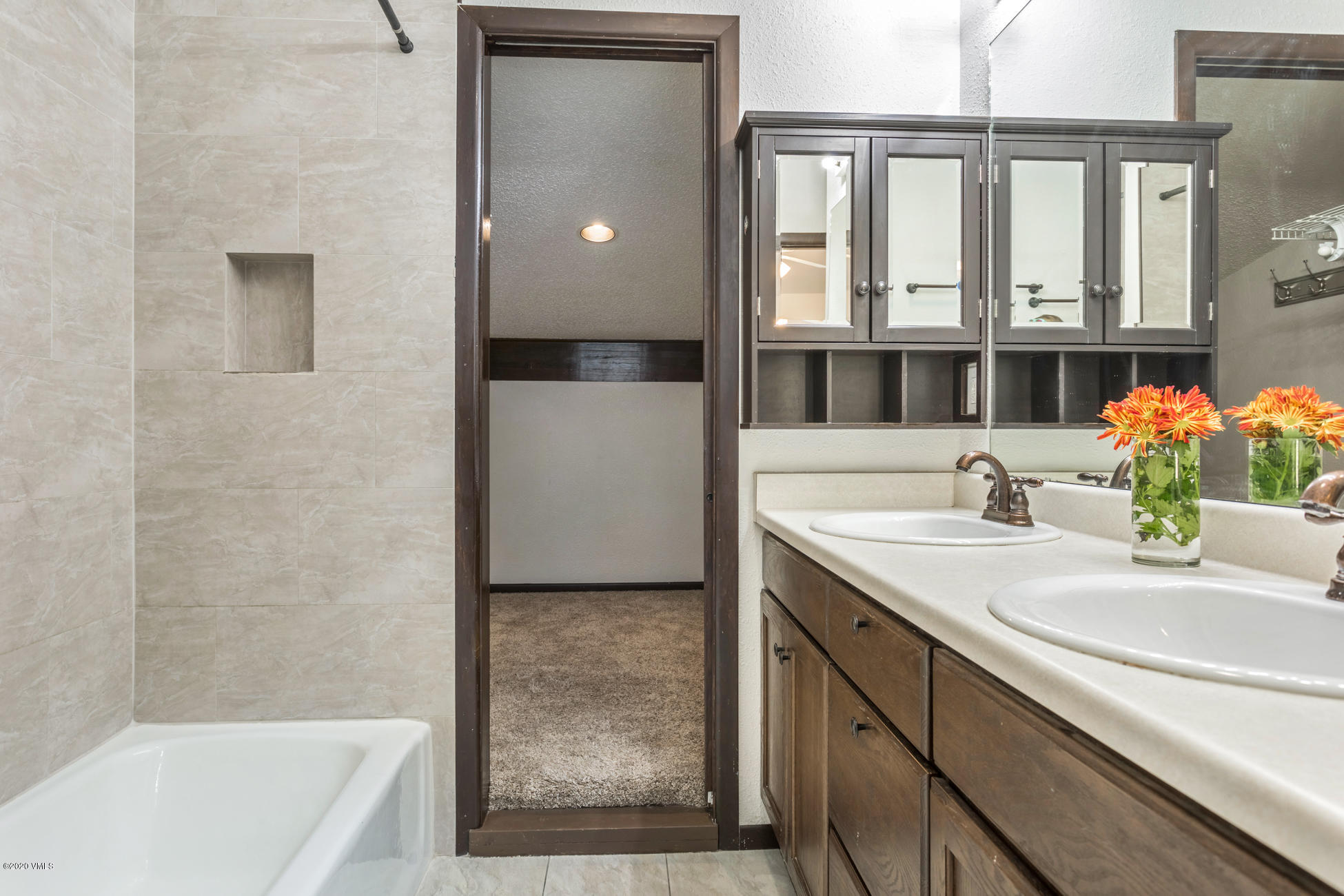 225 Gopher Road, Unit H54 Avon, CO 81620 - Photo 22 of 33 a bathroom with a sink and a bathtub
