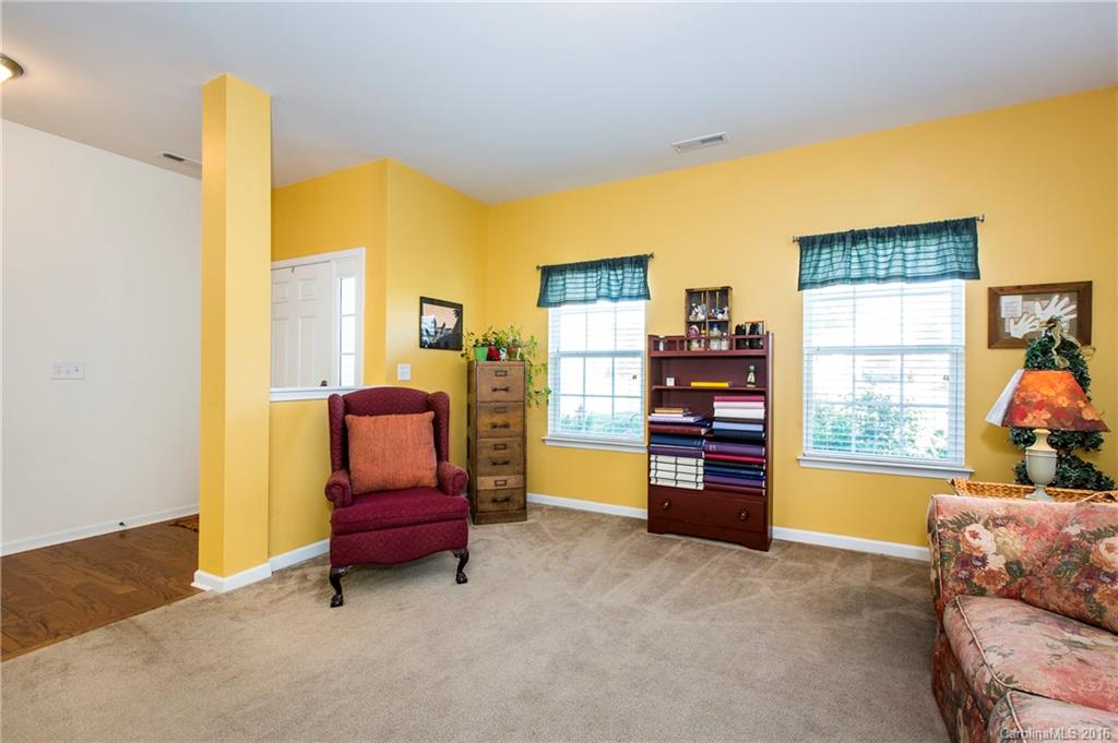 1621 Beleek Ridge Lane Clover, SC 29710 - Photo 5 of 24 a living room with furniture and a flat screen tv