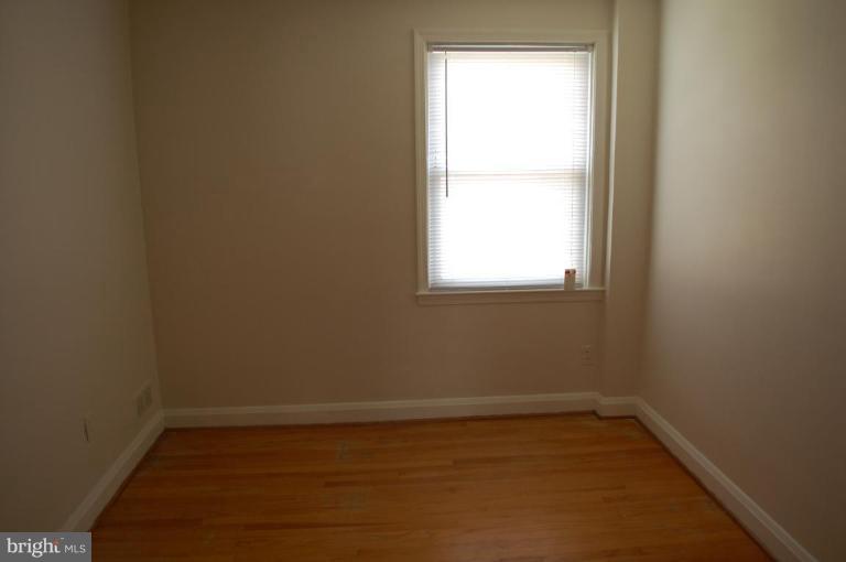 1660 Northbourne Road Baltimore, MD 21239 - Photo 5 of 11 an empty room with a window