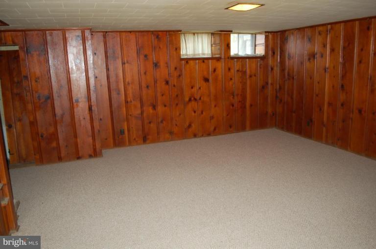 1660 Northbourne Road Baltimore, MD 21239 - Photo 9 of 11 a view of an empty room with a window