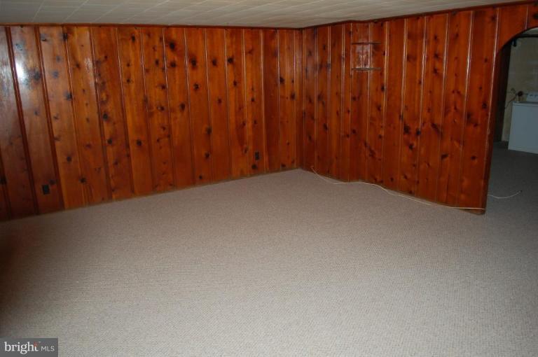 1660 Northbourne Road Baltimore, MD 21239 - Photo 10 of 11 a view of wooden floor