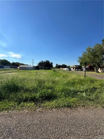 a view of a garden with an ocean