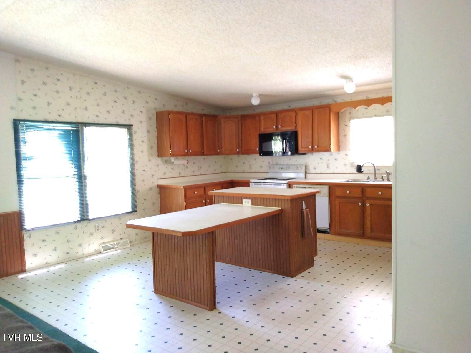 6331 Stephens Road Wise, VA 24293 - Photo 20 of 44 KITCHEN FROM DINING ENTRANCE
