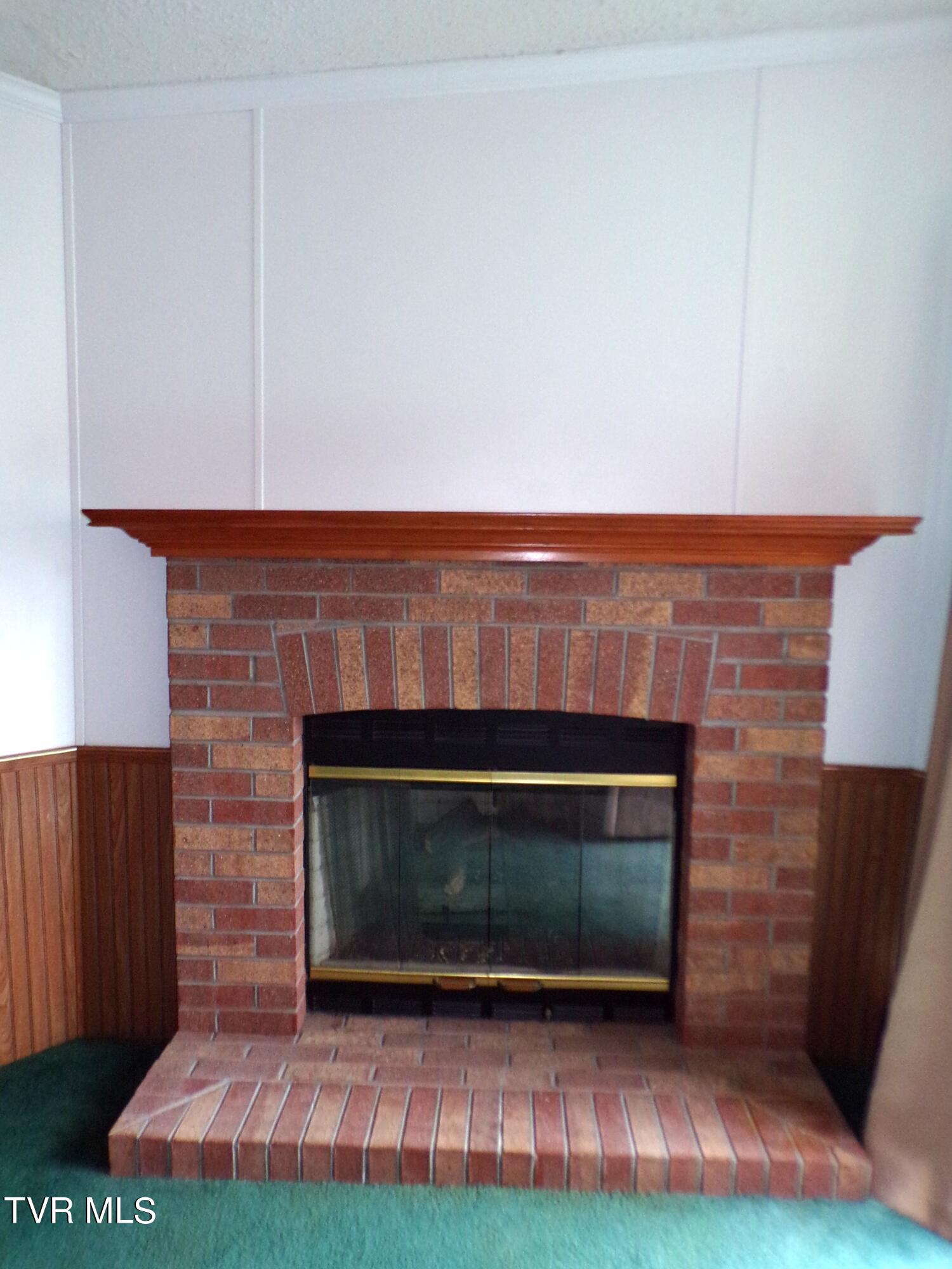 6331 Stephens Road Wise, VA 24293 - Photo 24 of 44 GAS LOG FIREPLACE IN DEN