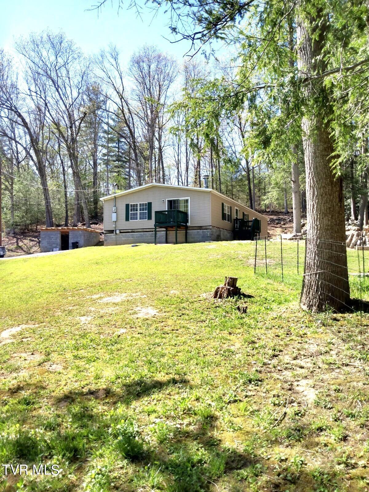 6331 Stephens Road Wise, VA 24293 - Photo 9 of 44 LEFT REAR CORNER FROM STREAM