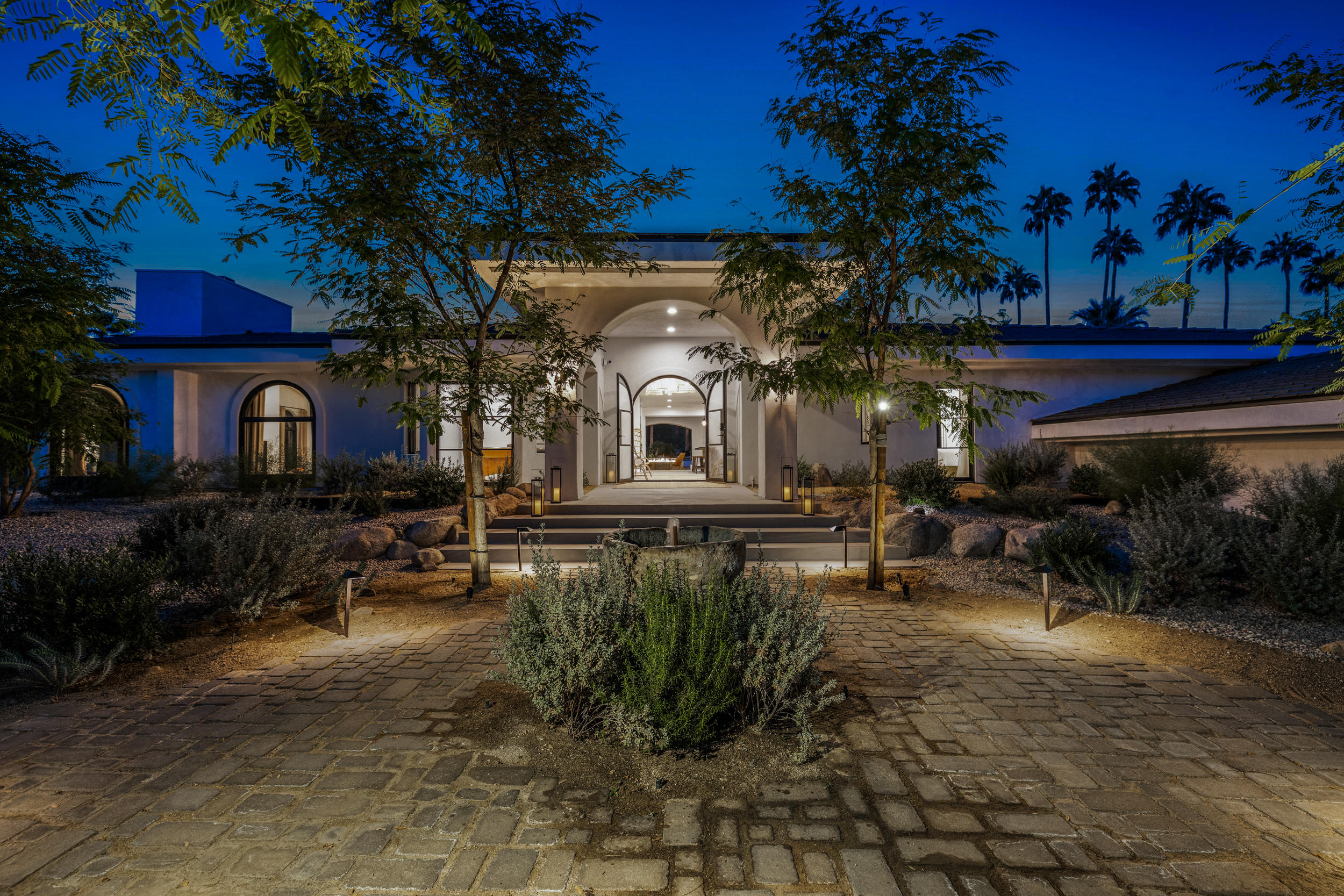 594 West Stevens Road, Unit A Palm Springs, CA 92262 - Photo 19 of 133 a front view of a house with a yard