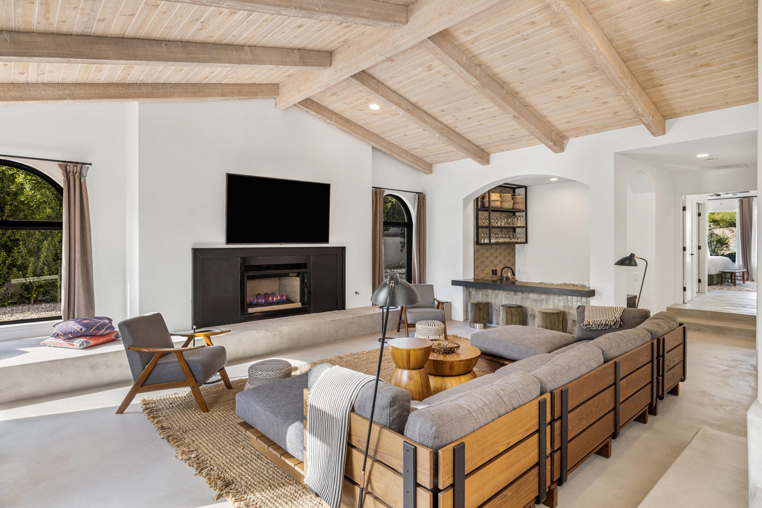 594 West Stevens Road, Unit A Palm Springs, CA 92262 - Photo 4 of 133 a living room with furniture and a fireplace