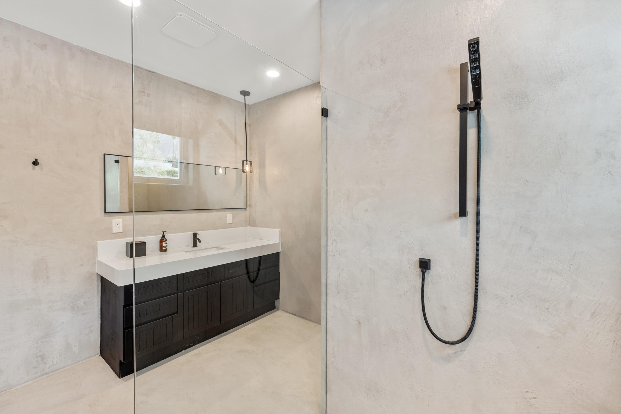 594 West Stevens Road, Unit A Palm Springs, CA 92262 - Photo 51 of 133 a bathroom with a sink vanity and mirror