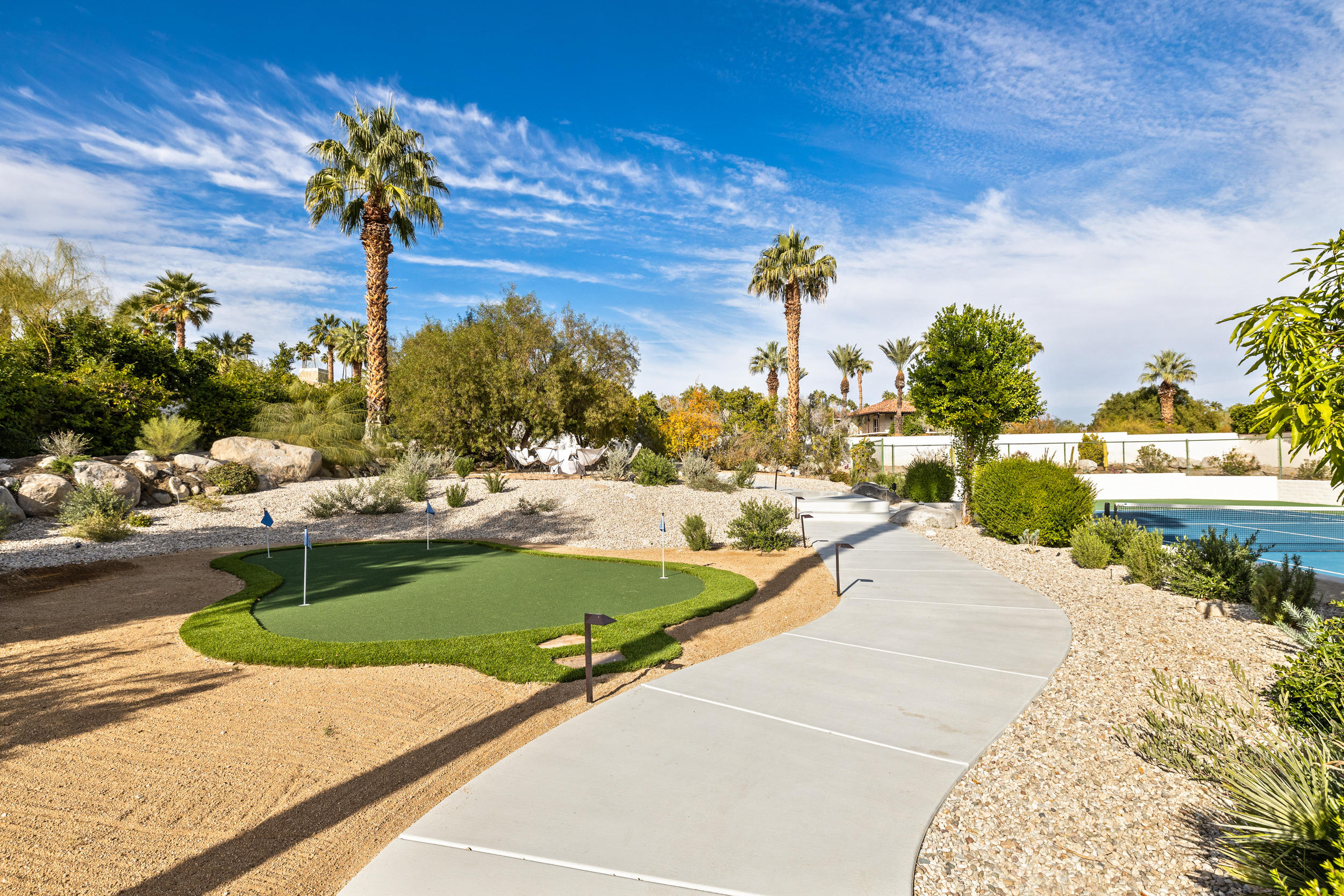 594 West Stevens Road, Unit A Palm Springs, CA 92262 - Photo 72 of 133 a view of a swimming pool with a yard