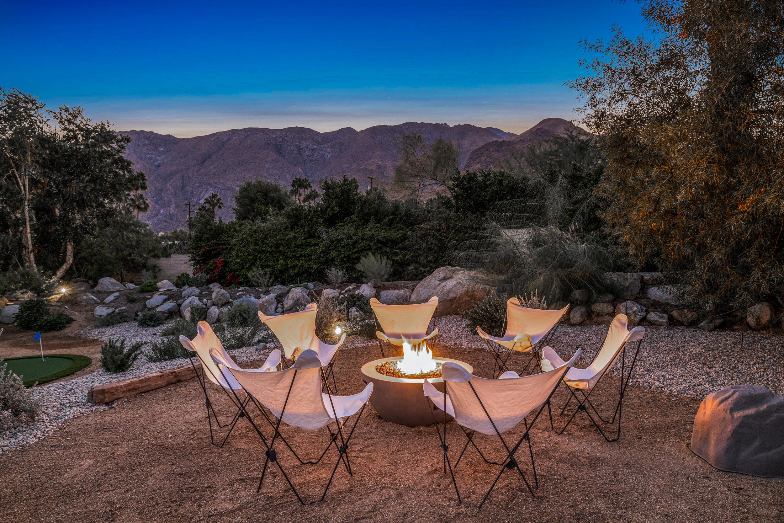 594 West Stevens Road, Unit A Palm Springs, CA 92262 - Photo 75 of 133 a view of a patio with a table and chairs