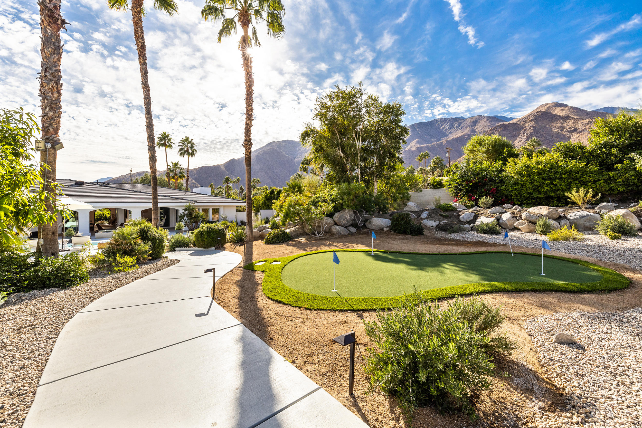 594 West Stevens Road, Unit A Palm Springs, CA 92262 - Photo 84 of 133 a view of a swimming pool with a yard