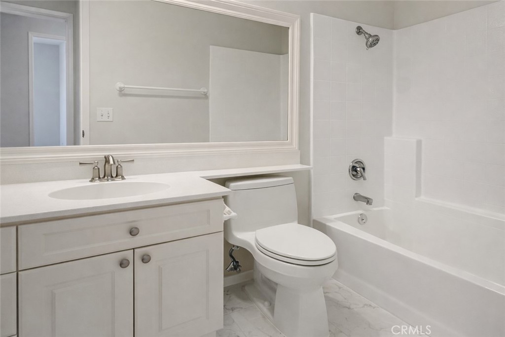 9 Diamant Way Aliso Viejo, CA 92656 - Photo 22 of 33 a bathroom with a sink toilet and shower