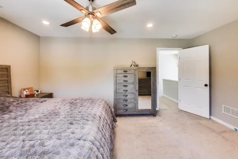 a view of a bedroom with closet