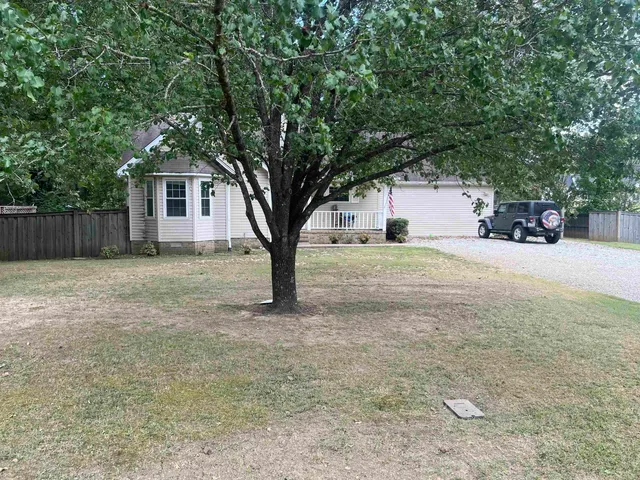 a house with trees in front of it