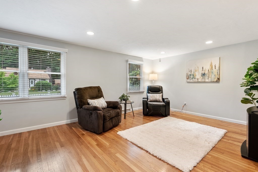 12 Cypress Road Natick, MA 01760 - Photo 14 of 41 a living room with furniture and a wooden floor