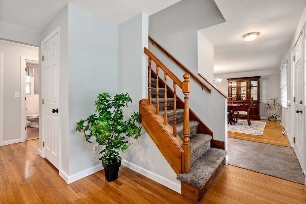 12 Cypress Road Natick, MA 01760 - Photo 17 of 41 a view of entryway and hall with wooden floor