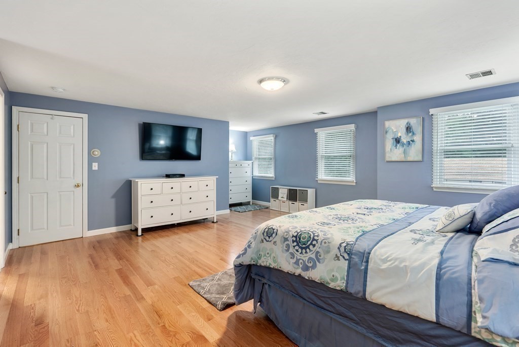 12 Cypress Road Natick, MA 01760 - Photo 19 of 41 a bedroom with bed and flat screen tv